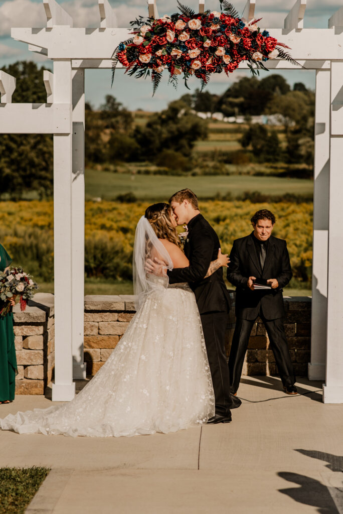 Bride and grooms first kiss 